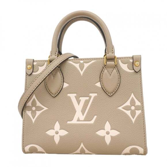 LOUIS VUITTON Handbags - Louis Vuitton Monogram Empreinte Bicolor OnTheGo BB Handbag M47054 Tourtrell ...
